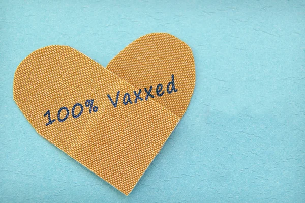 100 Vaxxed 텍스트로 모양의 Covid 코로나 바이러스 로열티 프리 스톡 이미지