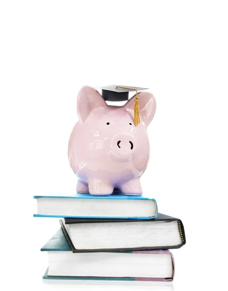 Books and graduation piggy bank — Stock Photo, Image