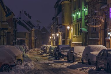 Snowy street, Brasov, Romania clipart