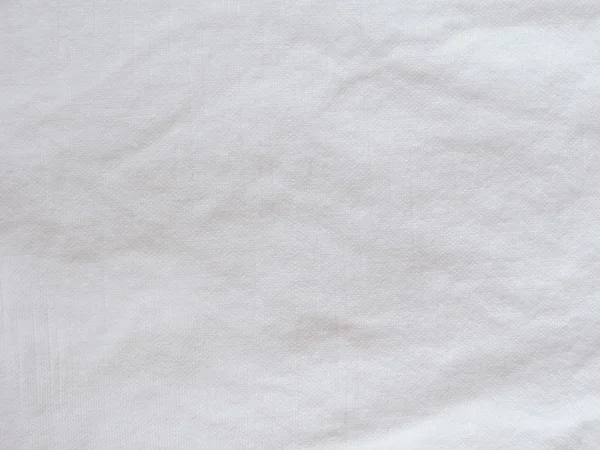 Bílé bavlněné tkaniny pozadí — Stock fotografie