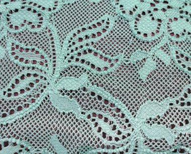 Işık yeşil mavi dantel bandı üzerinden siyah bir arka plan