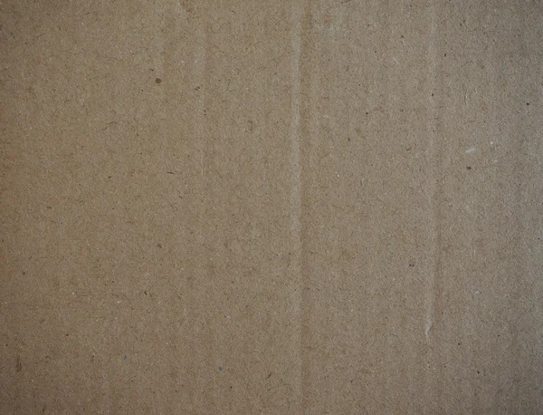 Коричневий гофрований картонний фон — стокове фото