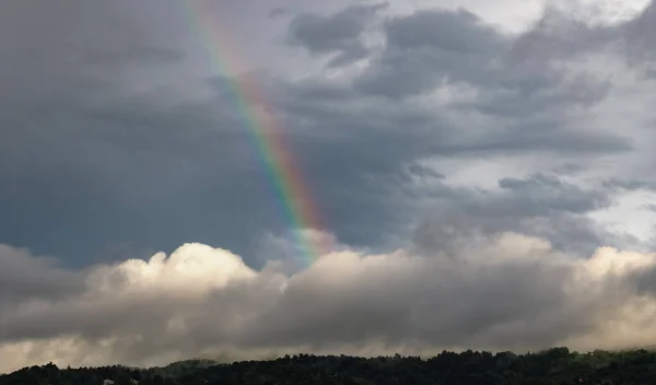 sky with rainbow after a heavy storm
