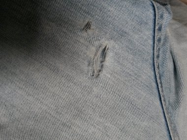 arka plan olarak yararlı yırtık kot kumaş