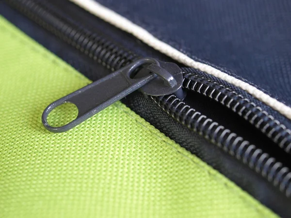 Zipper or zip fastener joining two edges of fabric