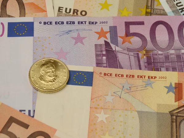 Euro (Eur) banknot ve madeni paralar para bir arka plan veya para kavram - Vatikan (Papa Benedict XVI üzerinden bir sikke olarak yararlı)