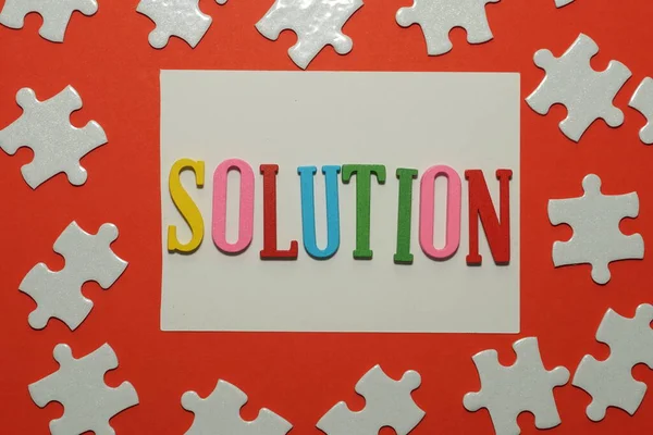 Solution Word Jigsaw Puzzle Red Background — Stock Photo, Image