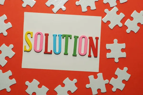 Solution Word Jigsaw Puzzle Red Background — Stock Photo, Image