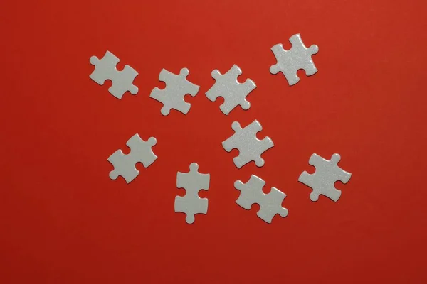 Pièces Puzzle Sur Fond Rouge — Photo