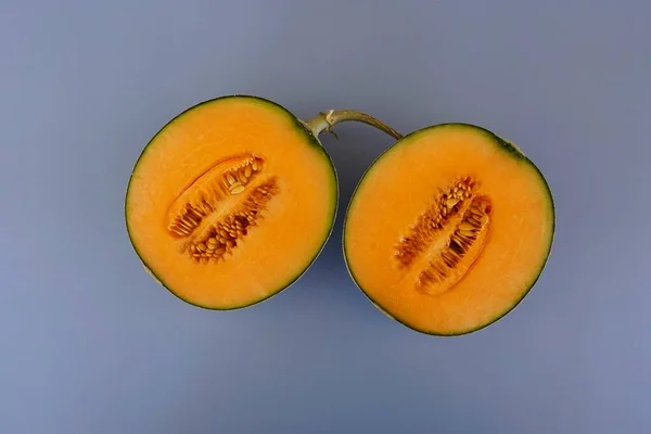 Melone Melata Frutta Sullo Sfondo Blu — Foto Stock
