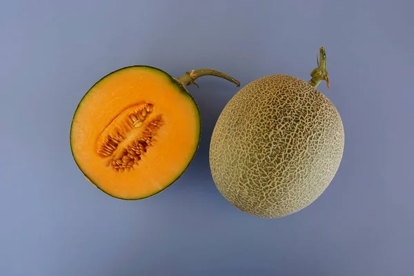 Honingdauw Meloen Fruit Blauwe Achtergrond — Stockfoto
