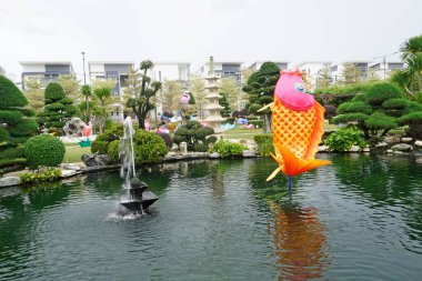 Kulim, Malezya - 1 Aralık 2019; Kulim, Kedah, Malezya 'daki MBI Desaku parkında yeşil bir kamu bahçesi manzarası