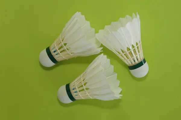 Badminton Shuttlecock Green Background — Stock Photo, Image