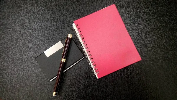 Red Diary Pen Black Background — Stockfoto