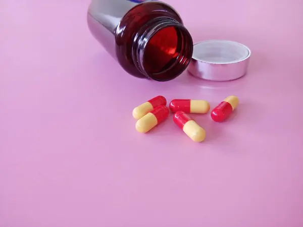 Capsules Bottle Pink Background — Stock Photo, Image