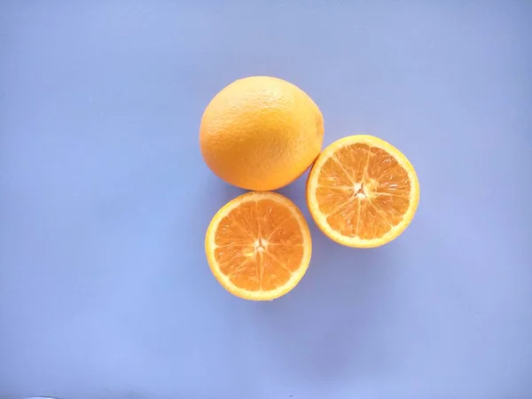 Orange Slices Isolated Blue Background — Stock Photo, Image