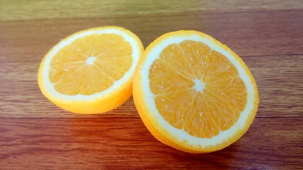 Orange Slices Isolated Brown Board — Stock Photo, Image