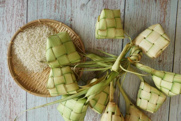 Ketupat (rice dumpling) is a local delicacy during the festive season in South East Asia. Ketupat, a natural rice casing made from young coconut leaves for cooking rice
