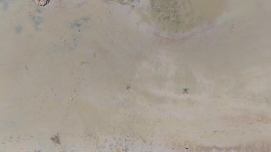 Beautiful aerial footage capturing the vivid turquoise waters and rocky coastline of Rose Bay in Bowen. The clear shallows, reef textures, and sweeping shoreline create a vibrant, tropical coastal scene full of colour, detail, and natural charm.