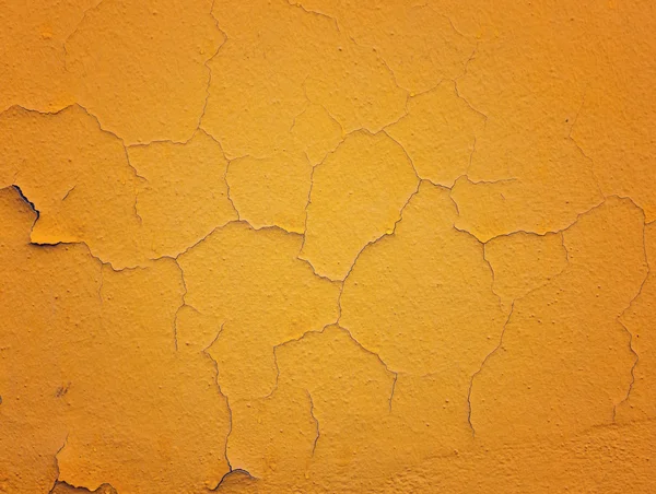 Yellow cracked wall background — Stock Photo, Image