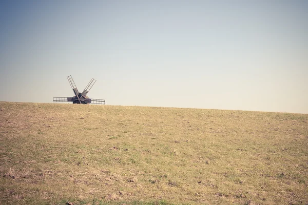 Countryside view with old windmill — Stock Photo, Image