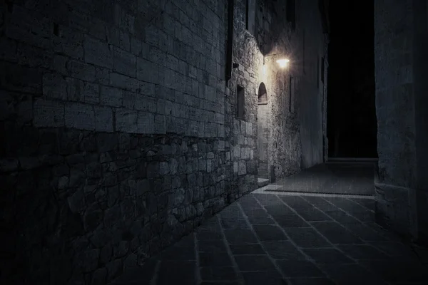 Old European street after dark at rainy night — Stock Photo, Image