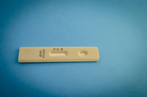 Lab scientist performing rapid diagnostic test RDT for antibodies to detect presence of viral protein antigens expressed by COVID-19 corona virus disease,CDC quick fast antibody point of care testing.