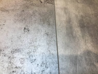 Gri grafit desenli, şık bir arka plan. aşınmış gümüş yüzey, parlak gri gölgeler. Mobilya dekorasyonunun alışılmadık rengi. Doğal doku, metal yüzey.