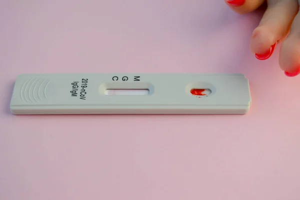 Positive Cassette rapid test for COVID-19, Test Result by Using Rapid Test Device for COVID-19 Novel Coronavirus.