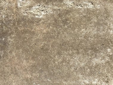 Doğal yapının yüzey dokusu katı gri güçlü beton, sert beton ve küçük çakıl taşları. Arkaplan.
