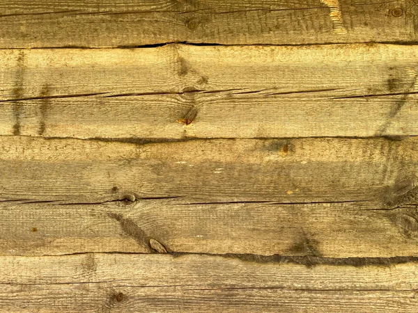 Planks of wood damaged by the aging process.