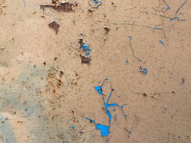 Sarı ve mavi eski çizik metal levha, soyulmuş demir paslı yüzey. Arka plan. Doku.