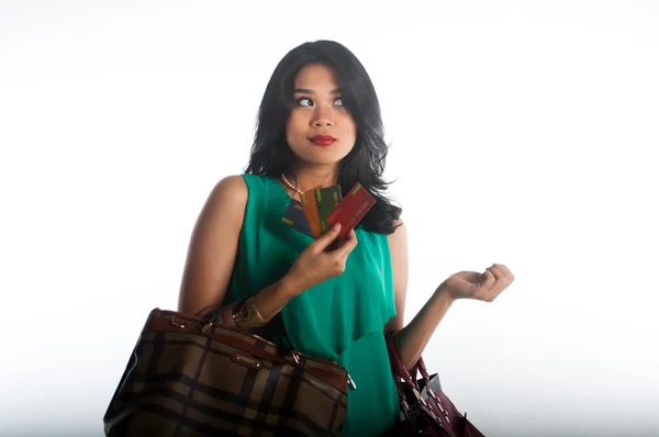 Shopaholic woman spending money and credit card for branded item — Stock Photo, Image