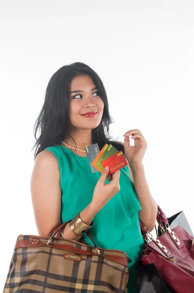 Shopaholic woman spending money and credit card for branded item — Stock Photo, Image