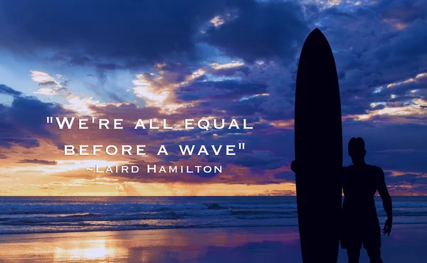 Silhouette of a surfer on the ocean with motivational words — Stock Photo, Image