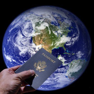 Dünya ve pasaport tutan el