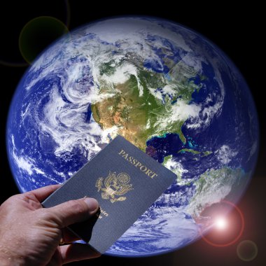 Dünya ve pasaport tutan el
