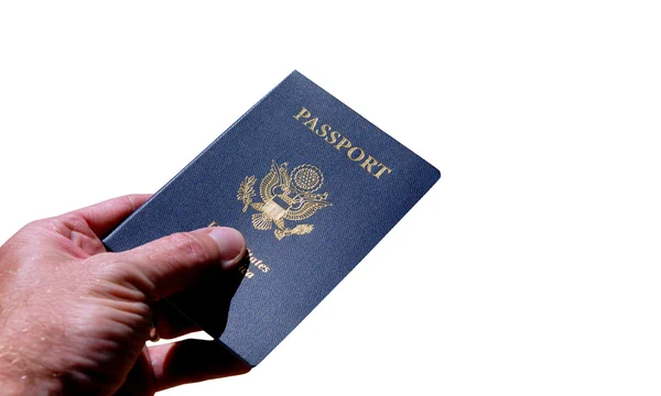 Mão segurando um passaporte americano — Fotografia de Stock