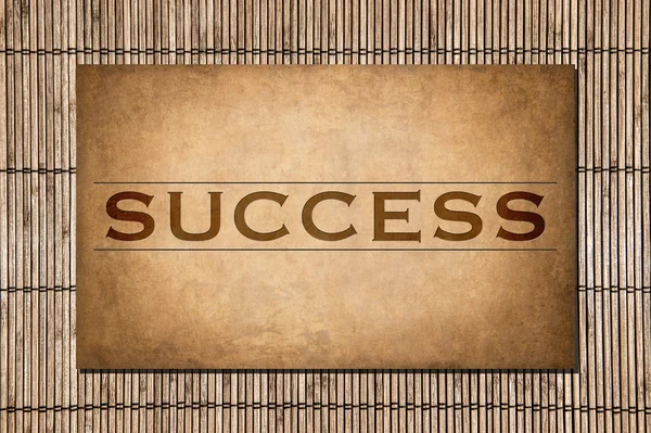 The word 'Success' on stone and bamboo — Stock Photo, Image