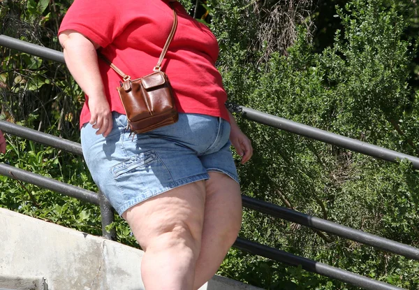 Overweight woman walking — Stock Photo, Image