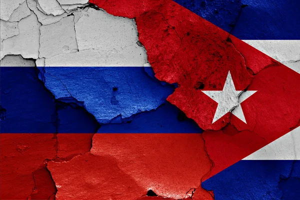 Vlajky Ruska Kuby Namalované Popraskané Zdi — Stock fotografie