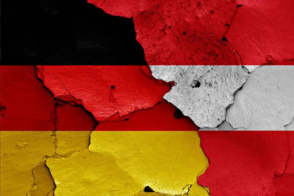 독일과 오스트리아의 깃발이 갈라진 페인팅되어 — 스톡 사진