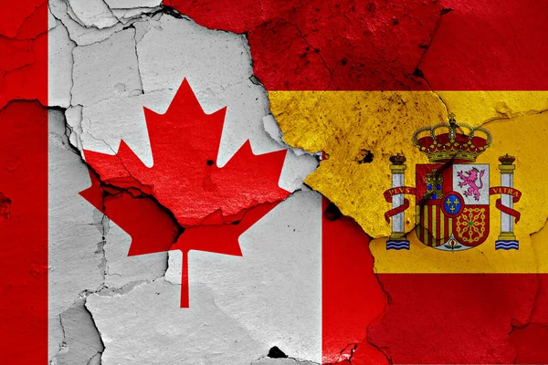 Flags Canada Spain Painted Cracked Wall — Stock Photo, Image
