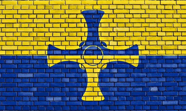 Bandera de Durham pintada sobre pared de ladrillo —  Fotos de Stock