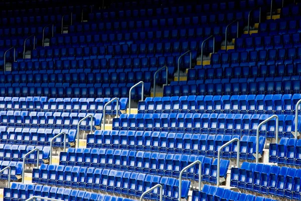 Empty blue stadium seats Royalty Free Stock Photos