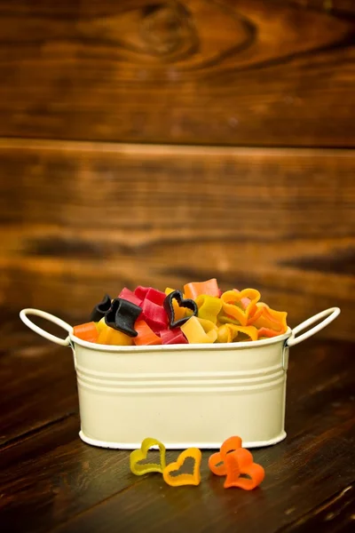 Italian pasta hearts shaped in bowl — Stock Photo, Image