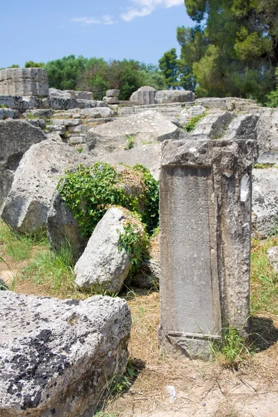 OLIMPIA, GREECE - JUNE 13, 2014: Building remains at ancient Olimpia archaeological site in Greece on June 13, 2014 — Stock Photo, Image