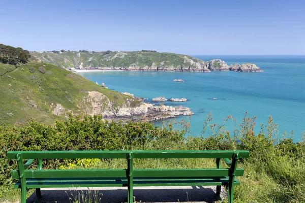 Bench overlooking south coast of Guernsey island, UK, Europe — Stock Photo, Image