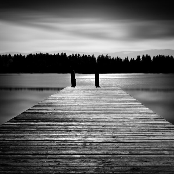Jetty on a lake in Bavaria, Germany, long time exposure
