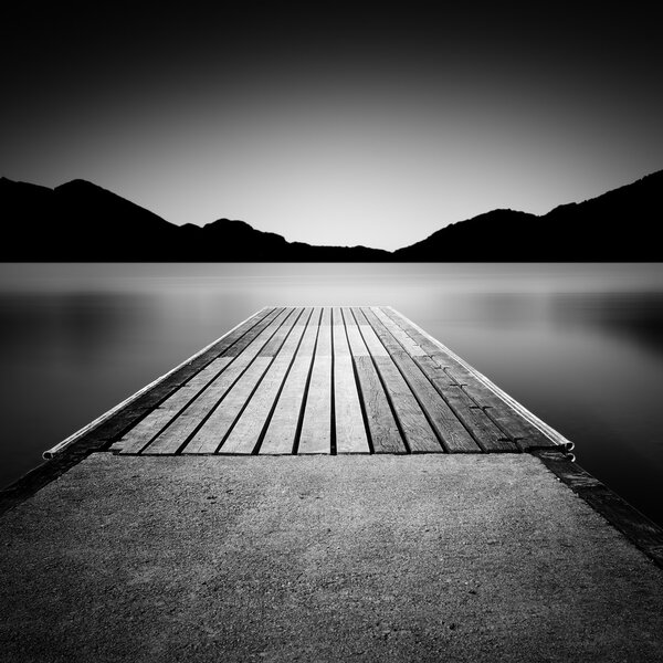 Jetty on a lake in Bavaria, Germany, long time exposure